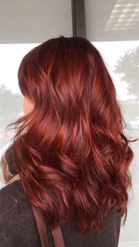 People with a dark skin tone may naturally have a dark hair colour and to make a style statement, going blonde could be an option. This cool toned red hair is perfect for winter and the ...