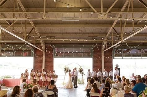 Guests Sitting At Tables During Ceremony Weddings Planning