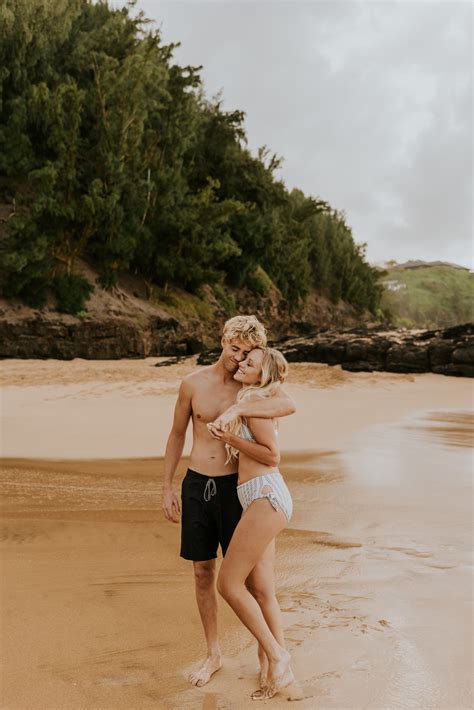 Kauai Beach Engagement Session With Surfboard