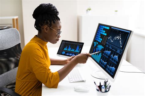 african american business data analyst woman using computer mtc training