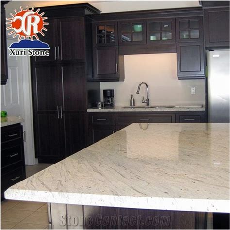 The solid surface counter underneath has the same cool white base with soft gray veining and ultrafine speckles. Cheaper River White Solid Color Granite Countertop from ...