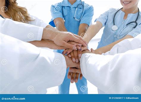 Doctors And Nurses In A Medical Team Stacking Hands Stock Image Image