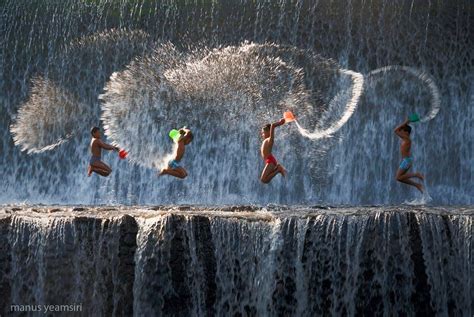 Children Playing Fun At Waterfall In Morning By Manus Yeamsiri On