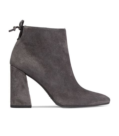 this is what fashion girls wear to a football game via whowhatwear grey suede boots grey ankle