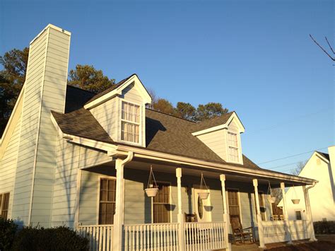 Asphalt shingles are easy on the wallet. CertainTeed Landmark "Colonial Slate" roof shingles ...