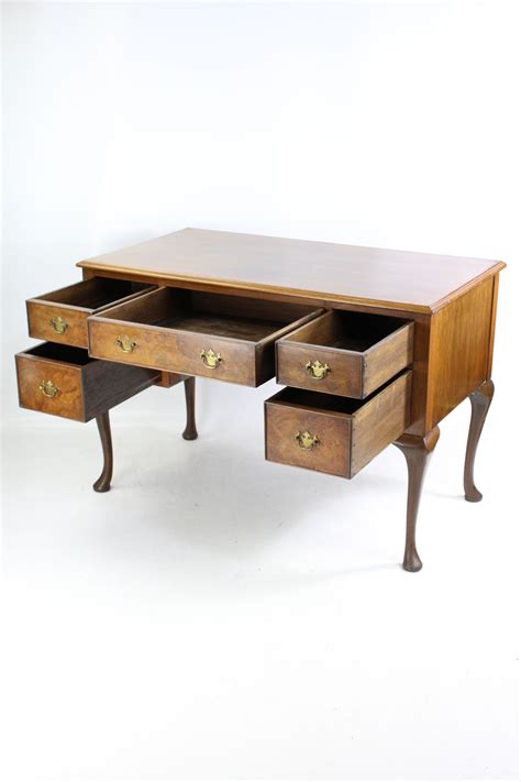 A practical and stylish walnut effect desk typically features a side cupboard and stationery drawer, shelving and multiple compartments, a raised monitor platform and. Vintage Walnut Desk on Cabriole Legs