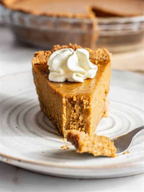 Pumpkin Pie With Graham Crust For Thanksgiving Baking With Butter