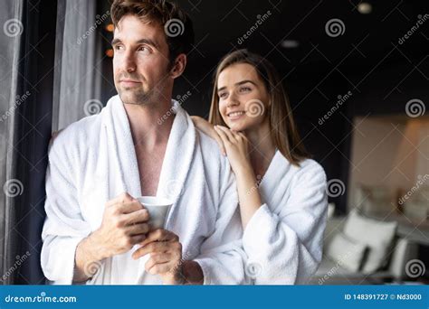 Couple In Bathrobes Enjoying Wellness Weekend In Hotel Stock Image
