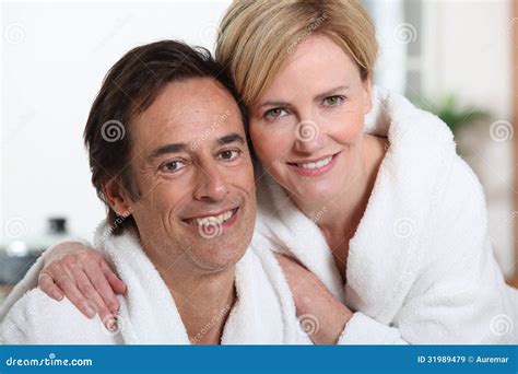 mature couple in bathrobes stock image image of happy 31989479