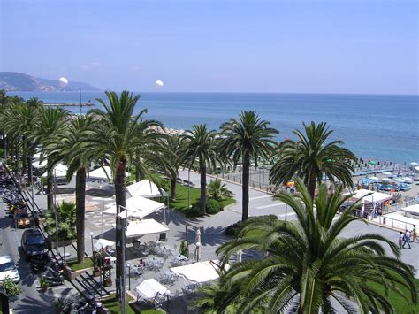 Palm trees on the beach in Loano, Italy wallpapers and images