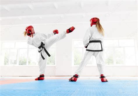 Young Female Fighter Boxing Using Karate Technique Kick And Punch