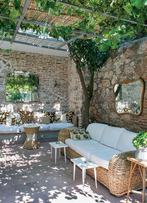 patio shaded with pergola covered in canvas, bamboo, and ...