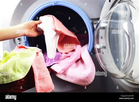 Machine Washer Hand Put Stock Photo Alamy