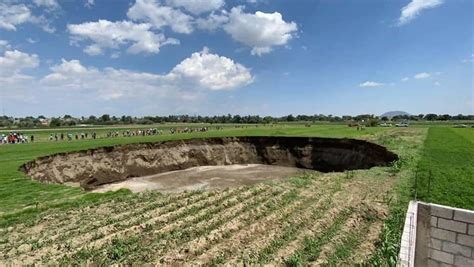 Gigantic 100 Meter Large Sinkhole Near Puebla Mexico In Pictures And