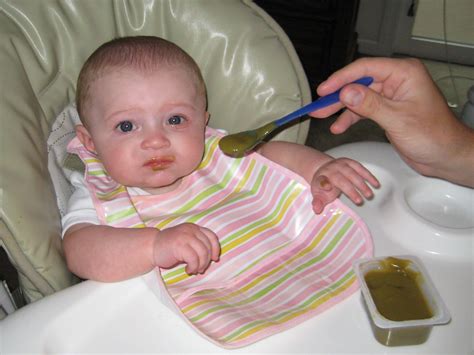 File:Baby eating baby food.jpg