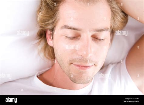 Young Man Sleeping In His Bed Stock Photo Alamy