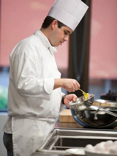 Cia Student Works In The Kitchen During Class At The Culinary Institute