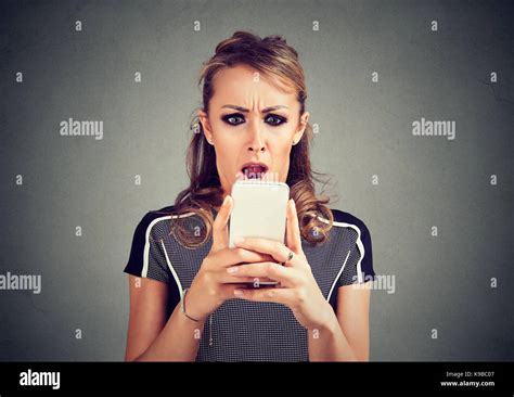 Shocked Surprise Woman Looking Phone Hi Res Stock Photography And