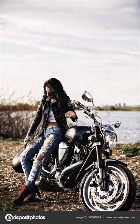 Beautiful Motorcycle Brunette Woman With A Classic Motorcycle C Stock Photo By Czamfir