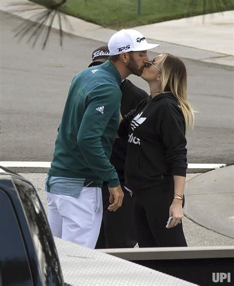 Dustin Johnson Kisses Paulina Gretzky Prior To His First Round At The