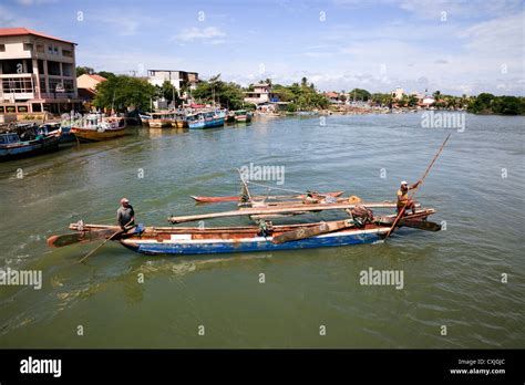 Traditional Catamaran Used By Fishermen In Sri Lanka Sailing In The