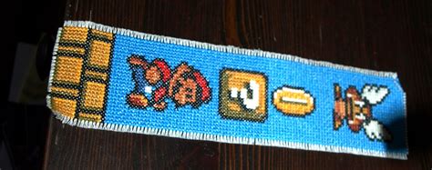 Maybe you would like to learn more about one of these? Super Mario cross stitch bookmark. pattern from ...