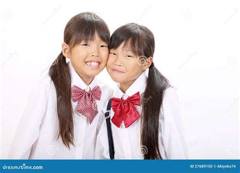 zwei kleine asiatische schulmädchen stockfoto bild von familie schönheit 27689150