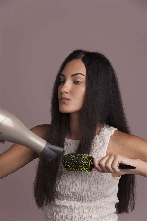 The longer you wait to blow dry your hair after you wash it, the more likely it is that your natural texture (which, in my case, is curls), will peek. Finding a Professional Hair Dryer For Your Hair Type