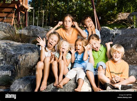Group Of Children Making Funny Faces Stock Photo Alamy