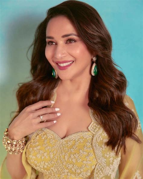 Madhuri Dixit Looks Like Sunshine In Yellow Organza Cape Set For Rs 1 Lakh See Mesmerising Photos
