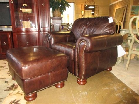 This leo reclining chair and storage ottoman set is loaded with model, consolation and comfort. Thomasville Leather Chair & Ottoman at The Missing Piece