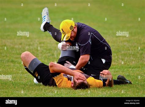 Injured Rugby Player Receiving Treatment Stock Photo Alamy