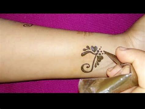 Mehndi design with hidden letter a,. DIY "T" Letter Henna Tattoo Design I Alphabet T Letter ...