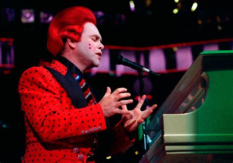 Sign up for our newsletter. Elton John's Top 10 Batshit Crazy Concert Outfits - NME