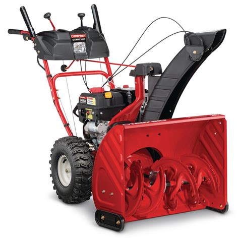 Clearing path will cut into large drifts with its 21 in. Troy-Bilt 26 in. 243 cc 2-Stage Gas Snow Blower with Electric Start Self Propelled and 1-Hand ...