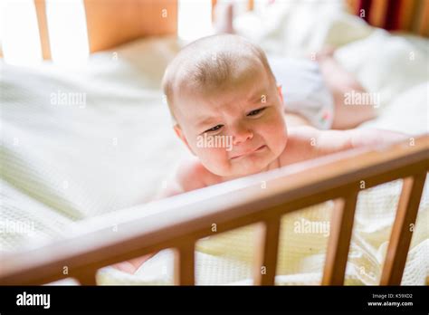 Baby Crying In Crib Hi Res Stock Photography And Images Alamy