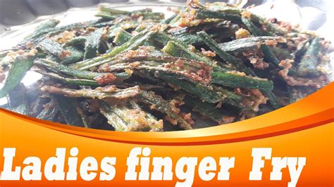A green colored oblong shaped vegetable, tapering at the end with tiny seeds inside. Ladies finger fry | Crispy lady's finger fry recipe in ...