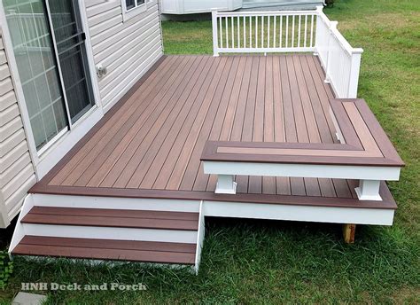 Vinyl Patio Deck Using Wolf Pvc Decking With Amberwood Flooring And