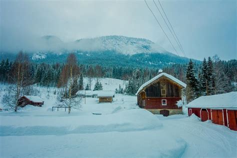 View Of Traditional Norwegian Mountain Red Wooden Houses Covered With