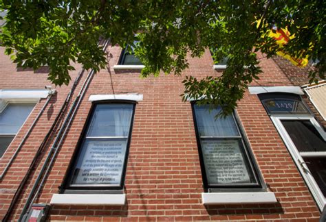 The First And Fourth Amendment Hang In The Windows Of This Home At 1420