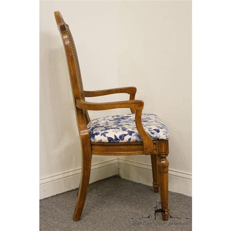 Split a tiny room or apartment with a shelving product that doubles as a cane back dining room chairs on the other hand. Thomasville Furniture Tapestry Collection Cane Back Dining Arm Chair | Chairish