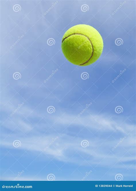 Yellow Tennis Ball In The Air Stock Images Image 13839044