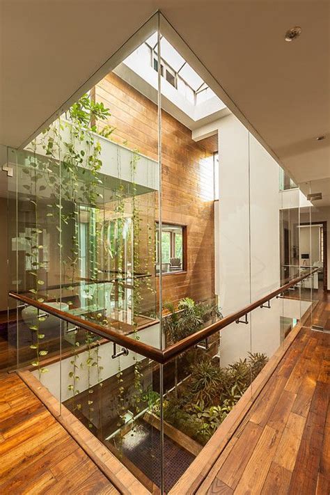 I love atriums. Such a beautiful way to enjoy a garden while blending