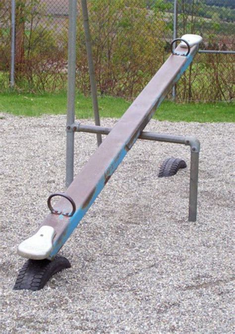 The Teeter Totter Also Known As A Seesaw Is A Common Playground