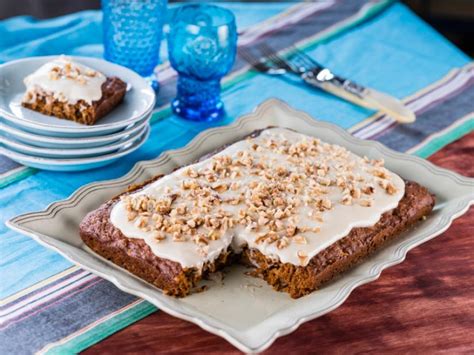 Alternating every so often between the two flavors, dip the cheese and jam balls in butter, then roll them to coat in the almond topping; Slimmed Down Carrot Cake Recipe | Trisha Yearwood | Food ...