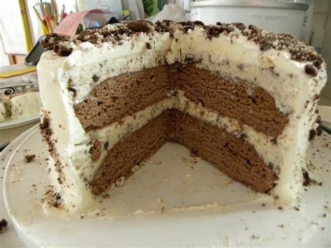 This moist and flavorful cookies and cream cake is layered with chocolate cake, oreo pudding, cool whip, and crushed oreos! Cookin' with Super Pickle: Oreo Mint Ice Cream Cake