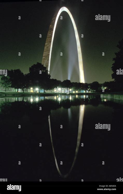 The Gateway Arch Reflected In A Pond At Night Jefferson National