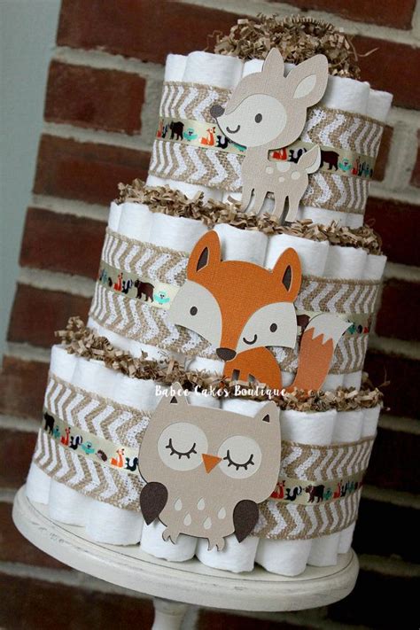 Most baby shower cakes are bathed in soft pastels and highlight loopy script, baby animal decorations, or toys. 3 Tier Woodland Animal Diaper Cake, Boys Woodland Baby ...
