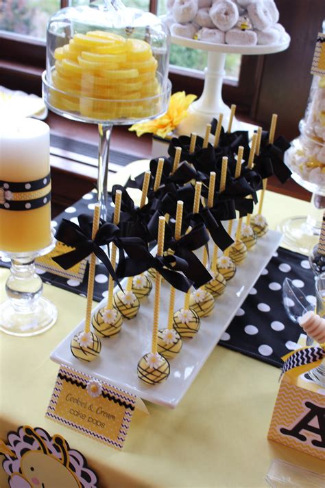 Create a fun baby block cake as the centerpiece of your table design. Sweet Simplicity Bakery — Bumblebee Themed Baby Shower ...
