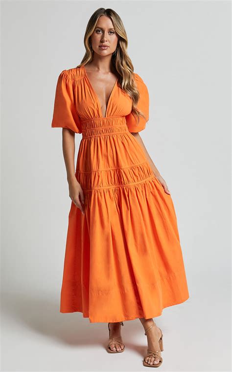 mellie midi dress puff sleeve plunge tiered dress in orange showpo